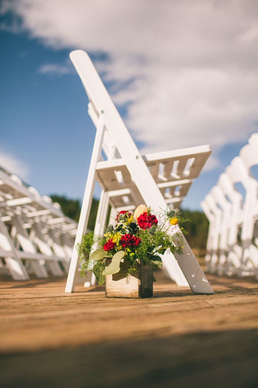 035 Evergreen Lake House Wedding Photographer asile flowers beet and yarrow