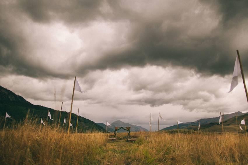 003 Crested Butte CO Private Ranch Wedding Local Foodie Stormy Rain Unique Initimate Burning of Sage Ceremony Barn Live Band Marquee Lights Stars Night Sky