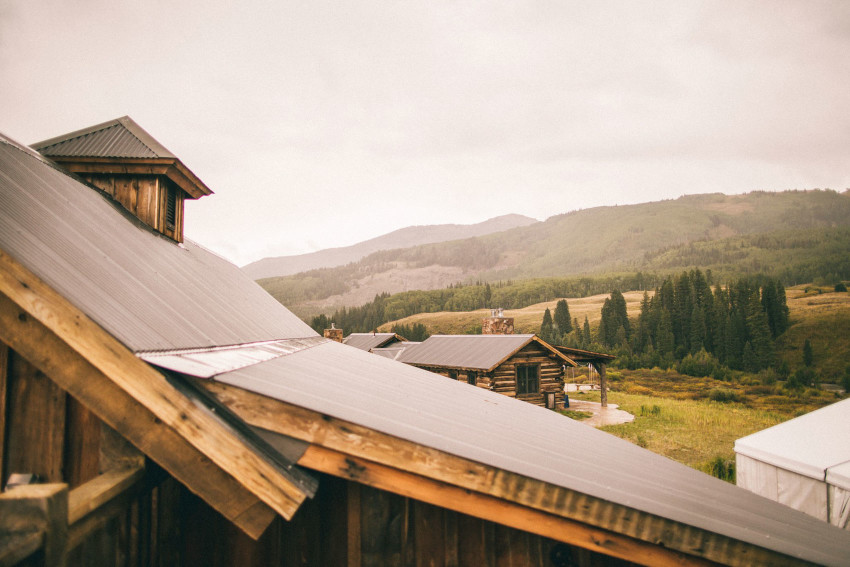 006 Crested Butte CO Private Ranch Wedding Local Foodie Stormy Rain Unique Initimate Burning of Sage Ceremony Barn Live Band Marquee Lights Stars Night Sky