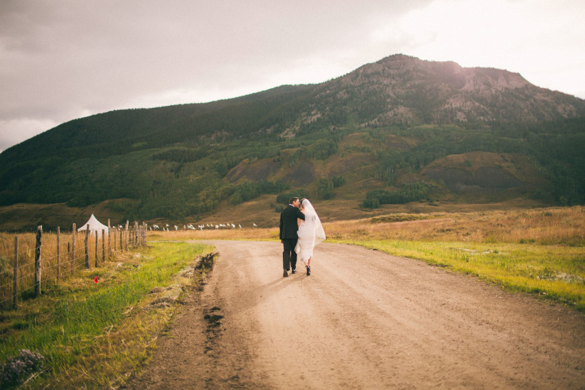 063 Crested Butte CO Private Ranch Wedding Local Foodie Stormy Rain Unique Initimate Burning of Sage Ceremony Barn Live Band Marquee Lights Stars Night Sky