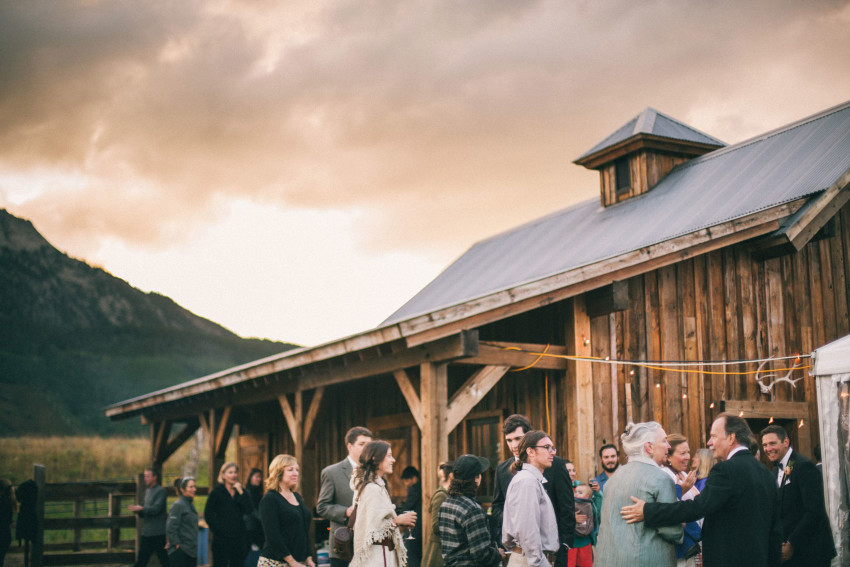 081 Crested Butte CO Private Ranch Wedding Local Foodie Stormy Rain Unique Initimate Burning of Sage Ceremony Barn Live Band Marquee Lights Stars Night Sky