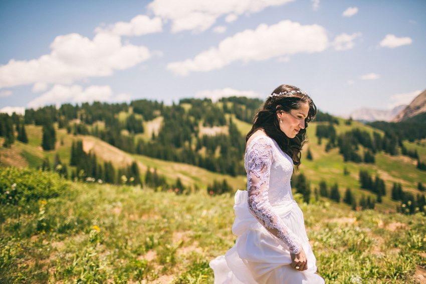 bride sees groom for first time first look mountain wedding crested butte