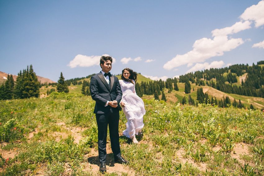 exciting bride walking toward groom first look crested butte washington gulch