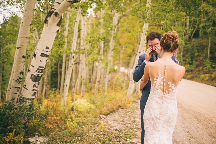 Crying groom first look crested butte