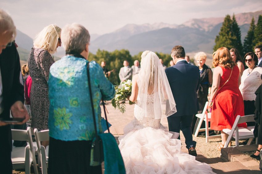 Dad walking daughter down the aisle ten peaks crested butte