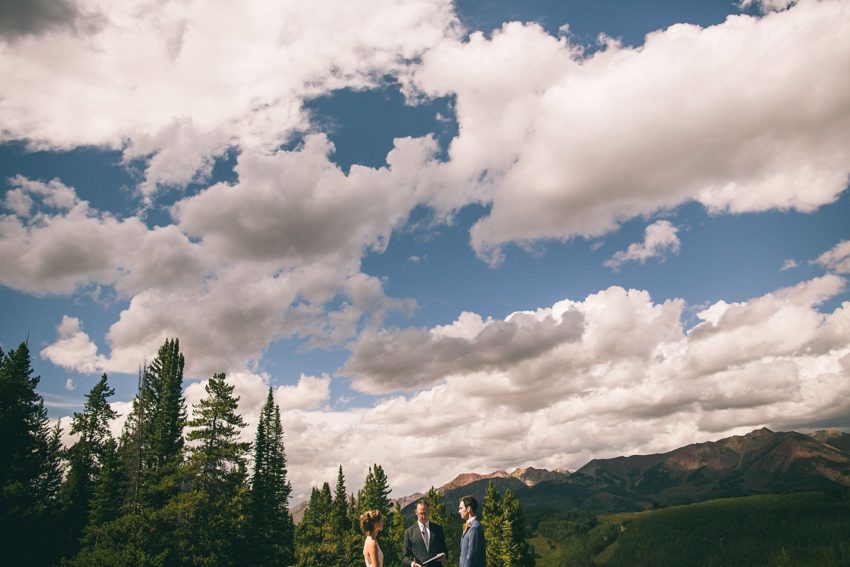 Bride and groom with beautiful crested butte skies
