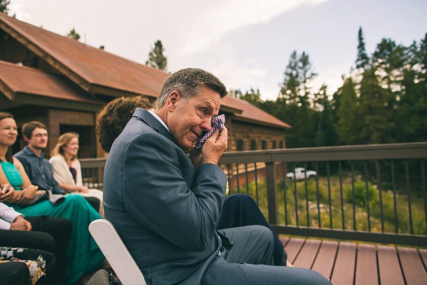 emotional crying father of bride during wedding ceremony