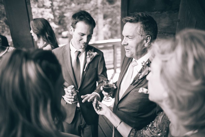 raining weather crested butte wedding day groom showing off his ring