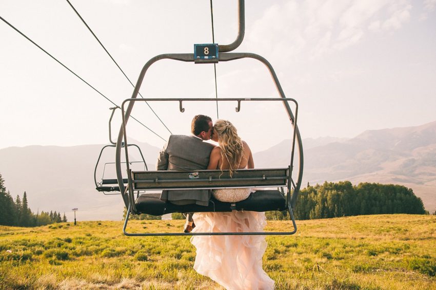 Bride and Groom on Ski Lift Portrait Wedding Day Ten Peaks Crested Butte