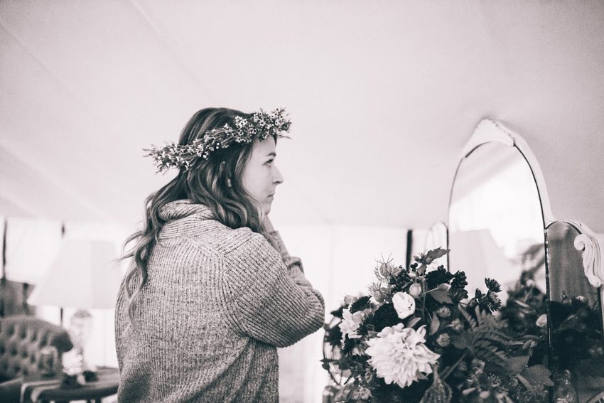 Bride with flower crown getting ready bridal suite River bend Lyons Colorado