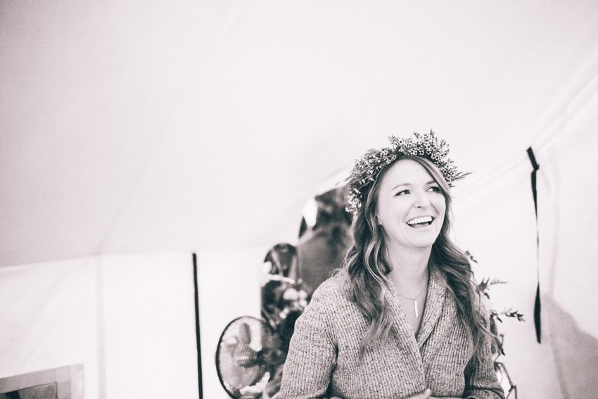 Bride with flower crown getting ready bridal suite River bend Lyons Colorado
