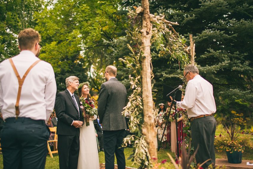 Bride and groom standing at the altar