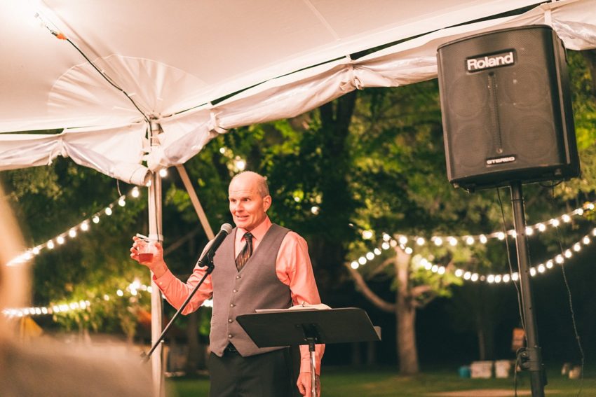 Grooms dad gives speech during wedding reception