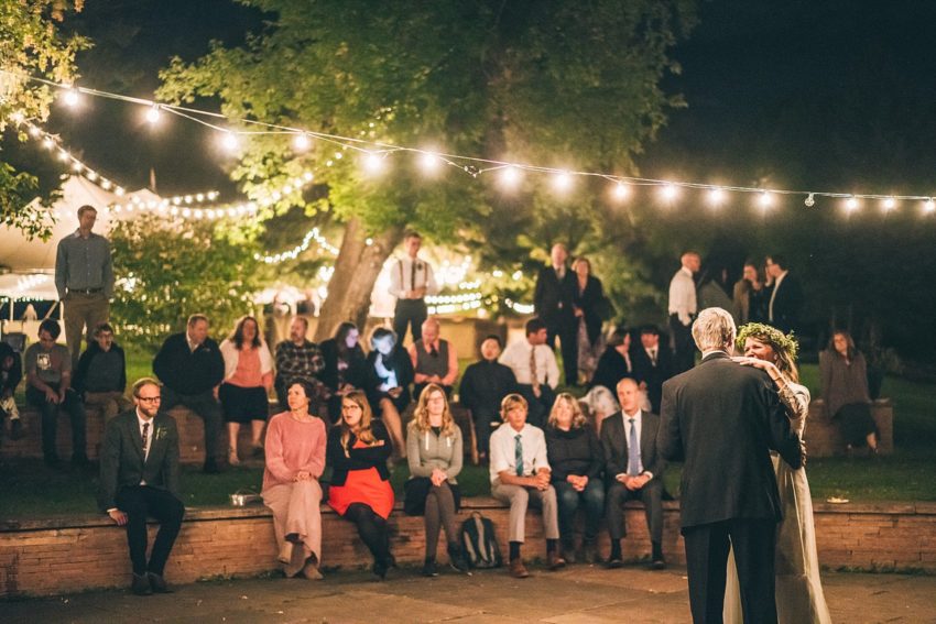 Bride and enjoying a dance with father during father daughter dance