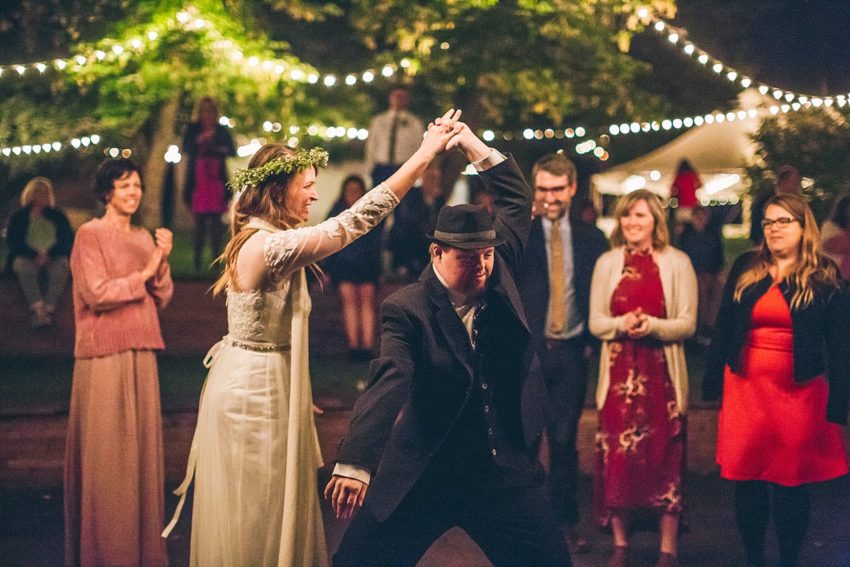 Bride dancing with wedding guests
