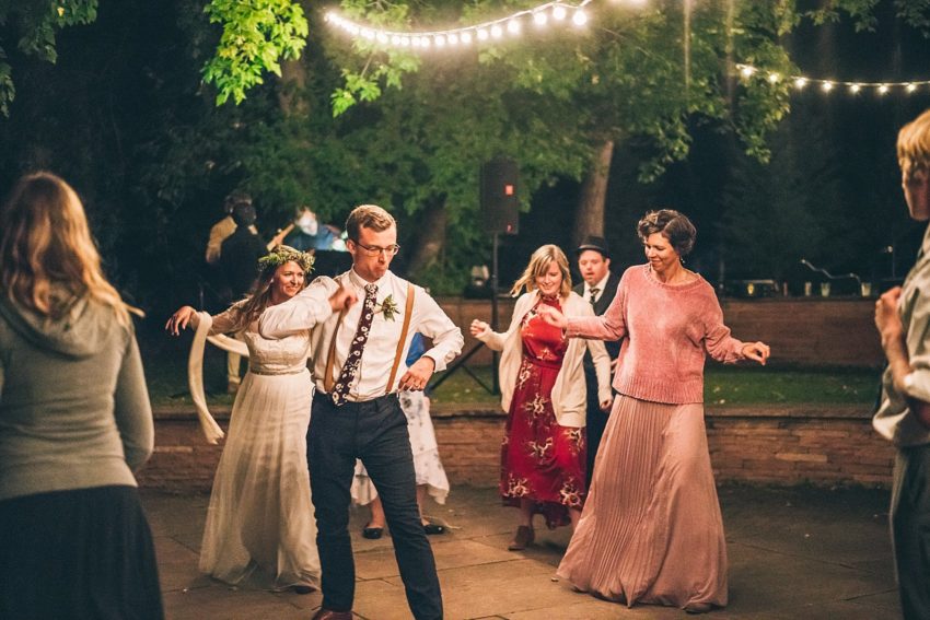 Bride dancing with wedding guests